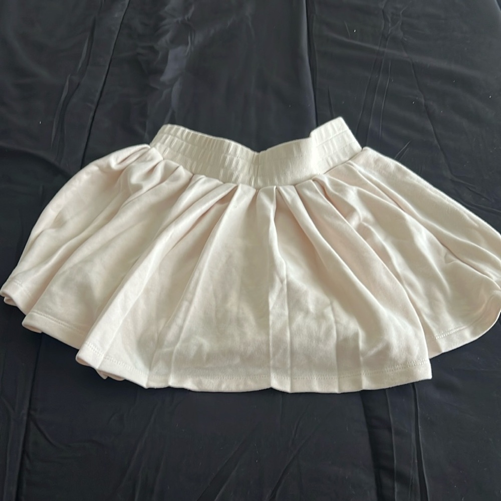 cream anwnd medium cotton skirt with shorts under